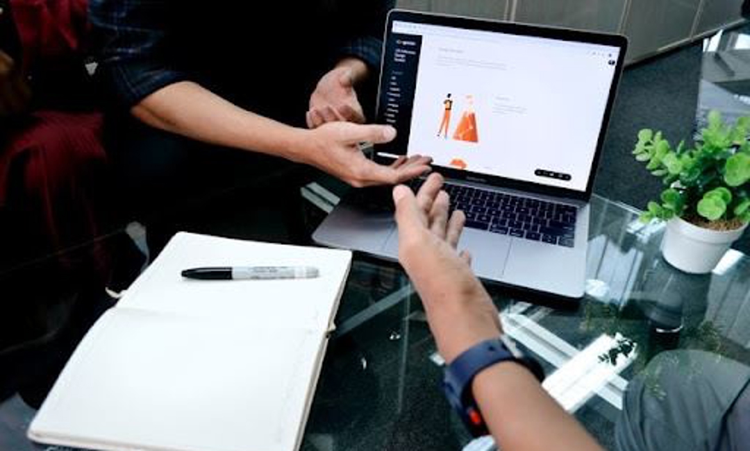 small business website hands laptop